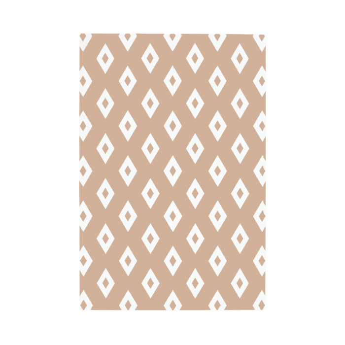 Flat lay of the puzzle playmat in diamond cinnamon, showcasing the warm neutral tone and repeating geometric diamond pattern