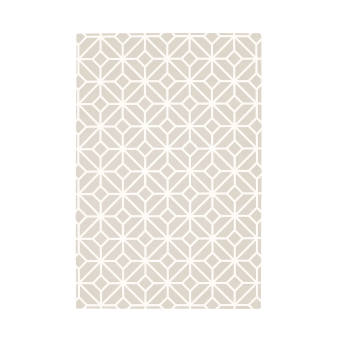 Cutout view of the puzzle playmat in tiles white sand, highlighting the soft neutral colourway and modern geometric tile design