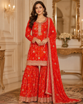 Red and gold embroidered three-piece sharara suit