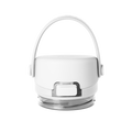 White ceramic vessel with gray base and translucent handle against white background