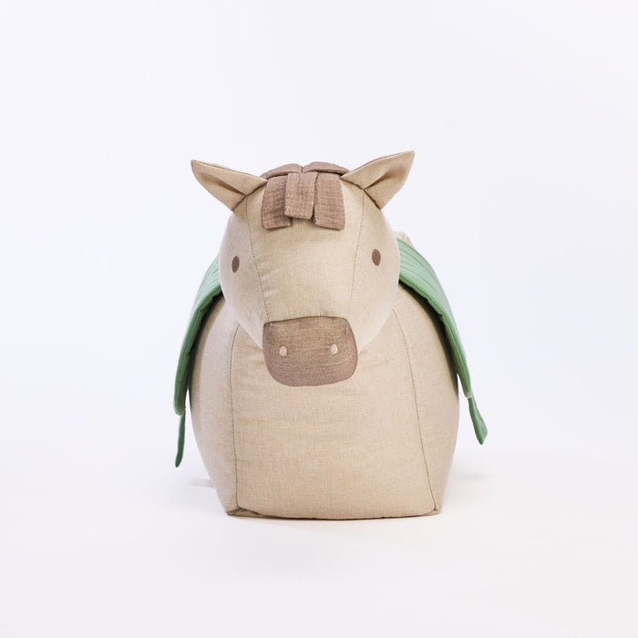 Cutout of Ride-On Henry Horse beanbag showing front profile with soft brown muzzle, stitched features and green quilted saddle