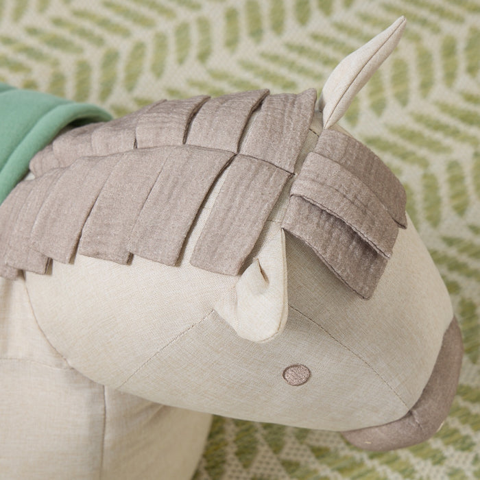 Close-up of Ride-On Henry Horse beanbag showing stitched detailing and soft textured mane in gentle neutral tones