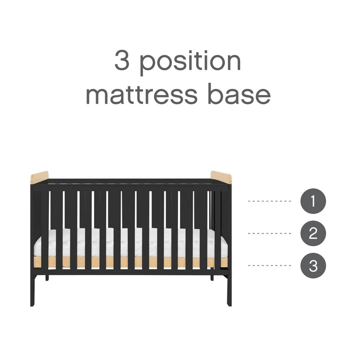 Rio Cot Bed in slate grey and honey oak with 3 adjustable mattress base heights to support safe sleep as baby grows.