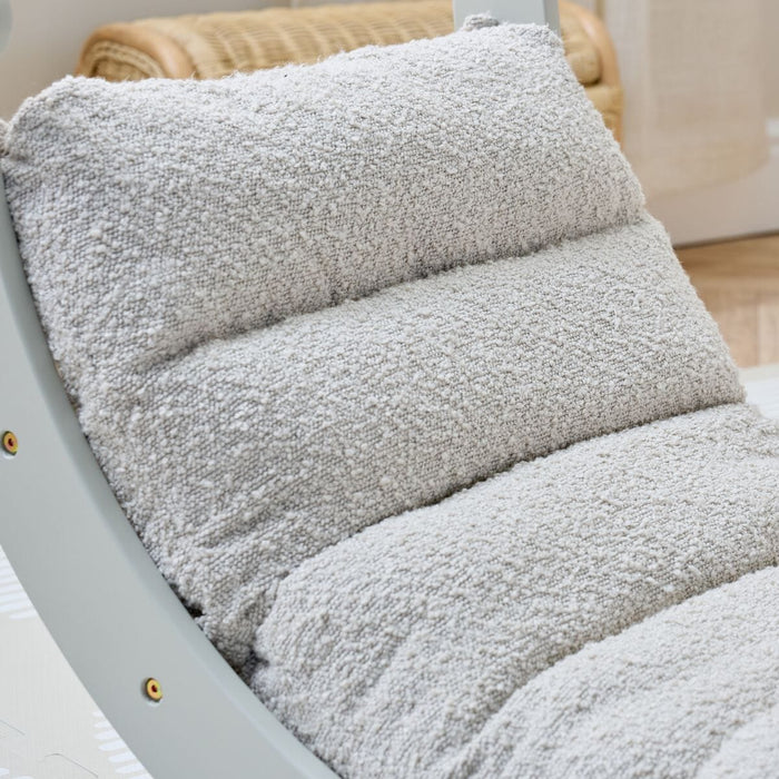 Fabric close-up of the Scala Montessori Pikler Cushion in Boucle Mushroom, showing plush texture and quilted comfort for toddlers