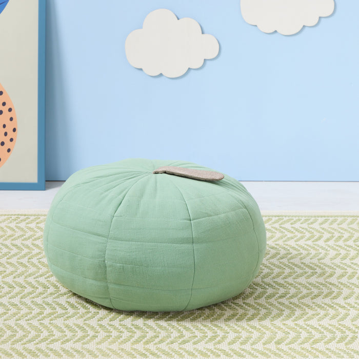 Soft Muslin Apple Cushion styled in a bright nursery space, adding playful charm and soft texture to the room’s décor