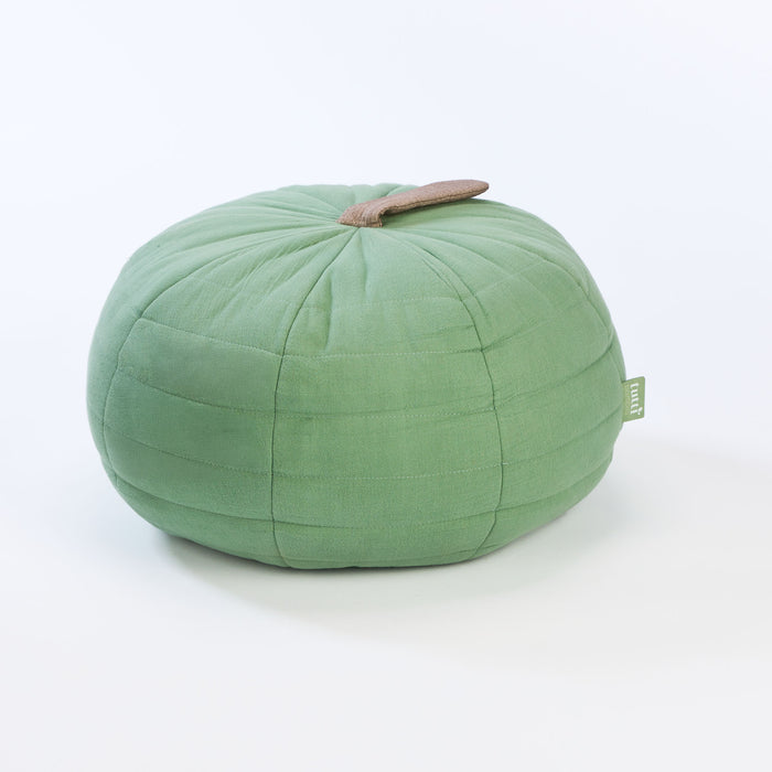 Cutout view of the Soft Muslin Apple Cushion showing round quilted body with soft green muslin texture and fabric stem detail