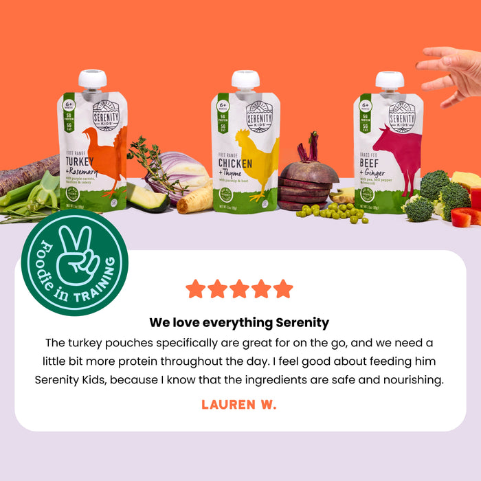 Serenity Kids food pouches with a hand reaching for one, surrounded by ingredients on an orange background.