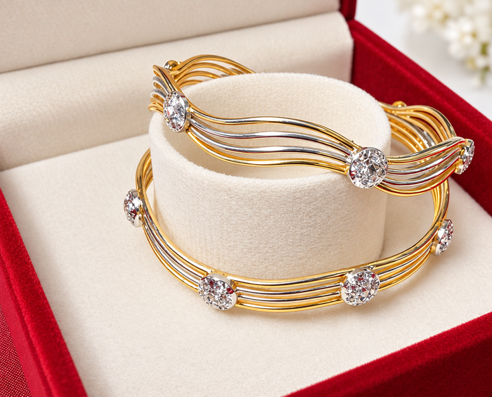 Two-tone gold and silver bangle set size 2.6