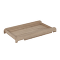 A wooden universal cot top changer with a light oak finish.